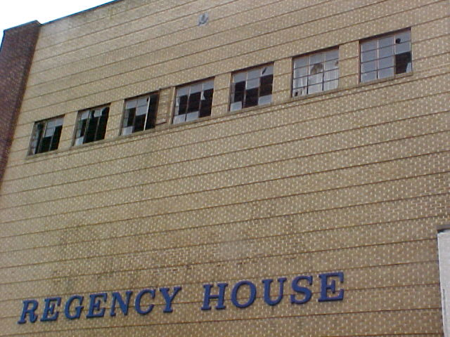 Regency Houses' damaged windows.